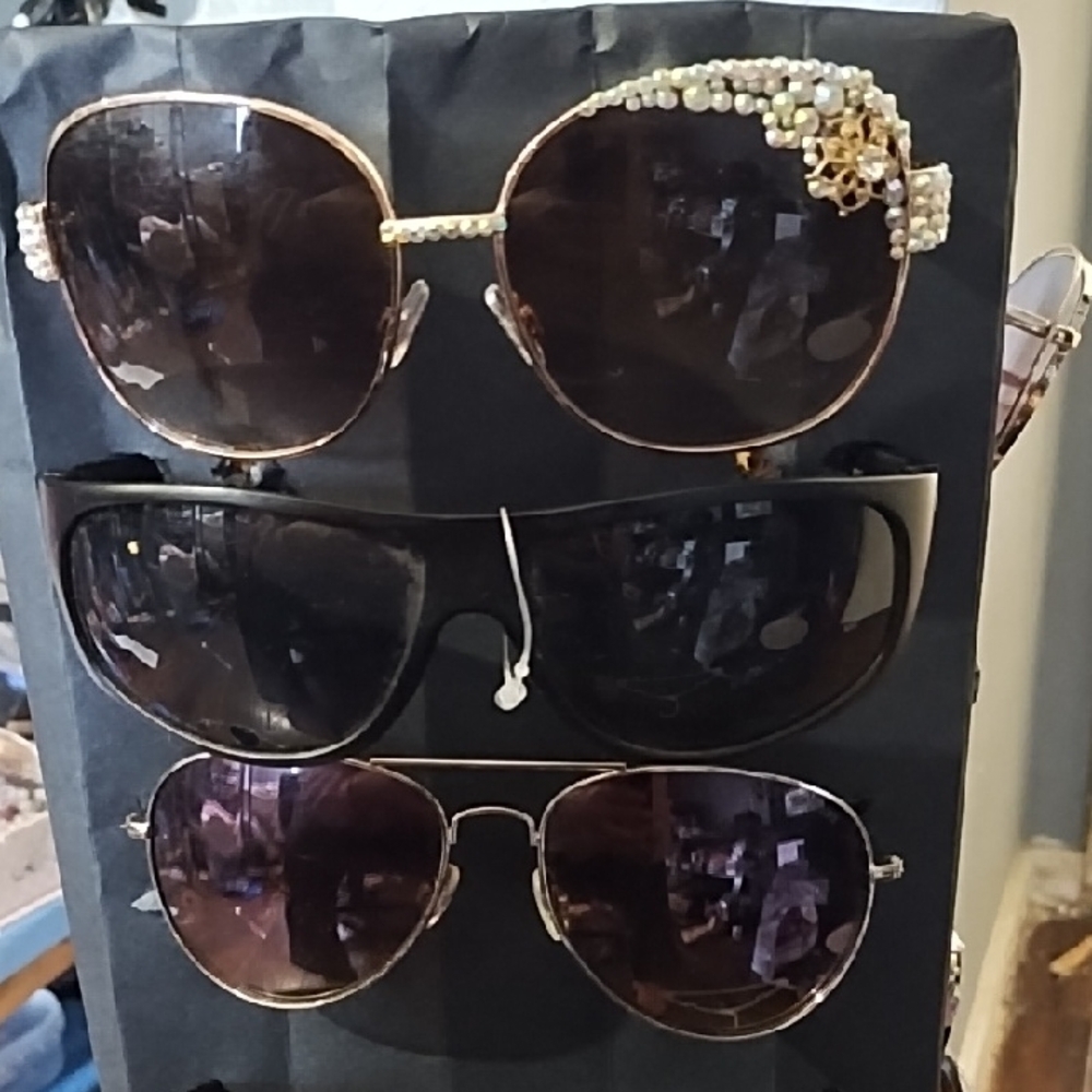 Sunglasses.  Buyers Choice Of One